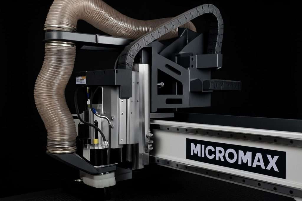 Micromax branded CNC router head with precision tooling and dust extraction system
